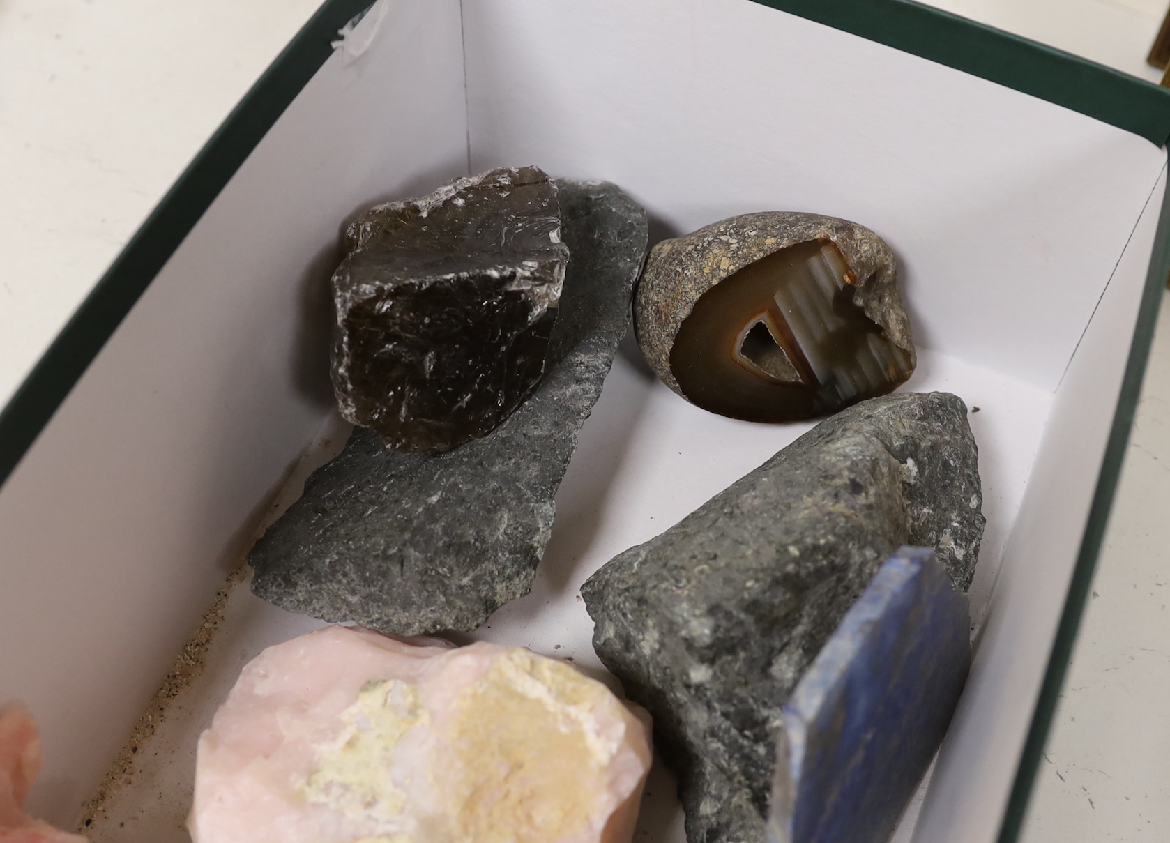 Assorted geodes including pink opal